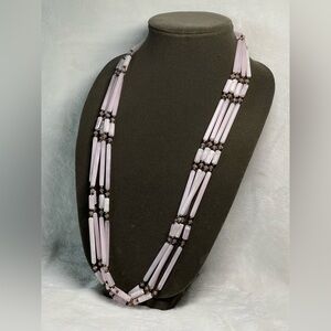 Vintage lucite pink beaded necklace .